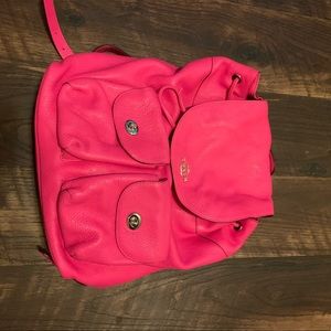 Hot pink Coach backpack.